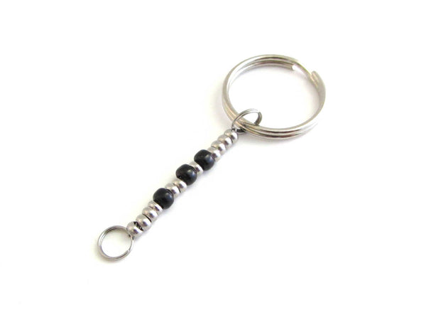 'sarah' name keyring written in morse code stainless steel and black glass seed beads