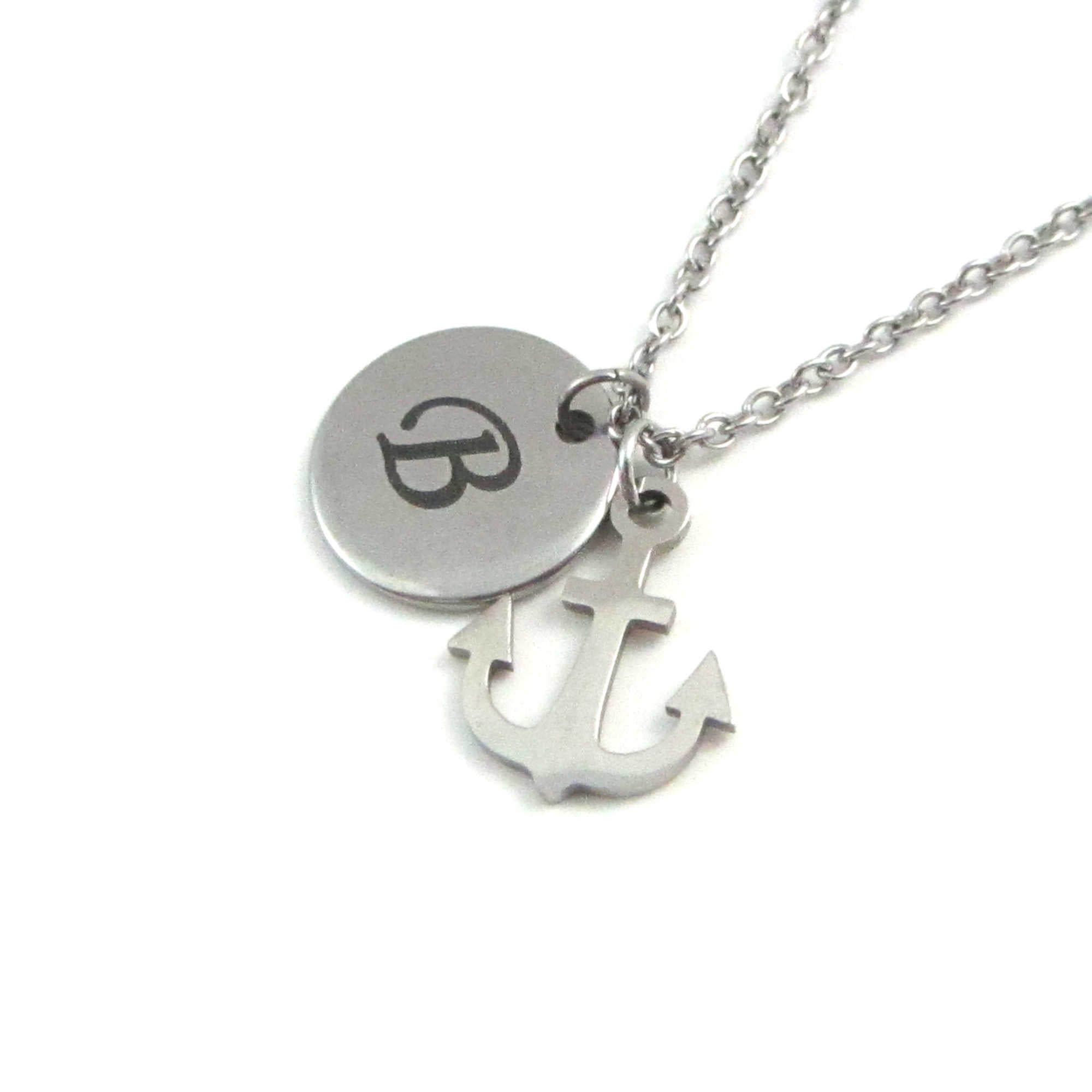 laser engraved capital initial letter disc charm and nautical anchor charm on a stainless steel chain