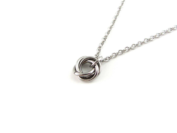linked rings chainmaille mobius ball on a stainless steel chain