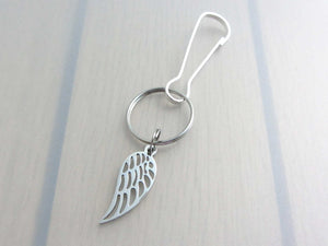 stainless steel single angel wing charm on a bag charm with snap clip hook