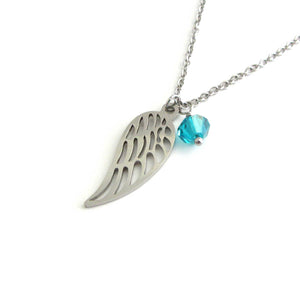 a single angel wing charm with blue/green crystal on a stainless steel chain