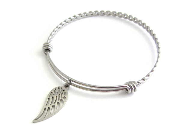 stainless steel single angel wing charm on a bangle with braided twist pattern