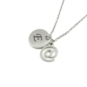 laser engraved capital initial letter disc charm and computer email at symbol sign charm on a stainless steel chain