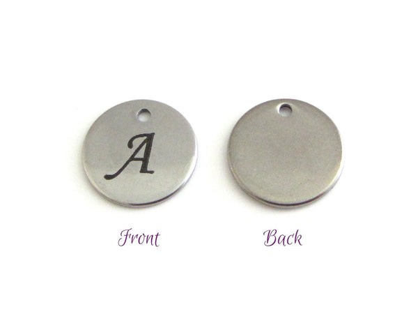 stainless steel disc charm front has letter, back is plain