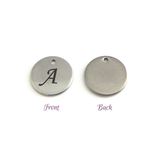 stainless steel disc charm front has letter, back is plain