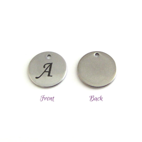 stainless steel disc charm front has letter, back is plain