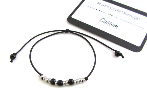 'sarah' name adjustable cord bracelet written in morse code stainless steel beads and black glass seed beads on black cord with custom morse code message card