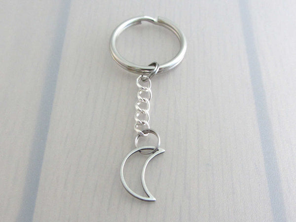 stainless steel hollow crescent moon charm on a chain keyring