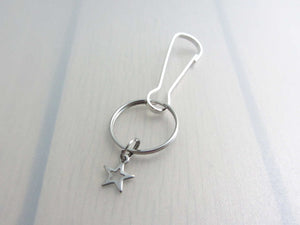 stainless steel hollow star charm on a bag charm with snap clip hook