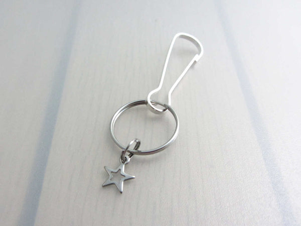 stainless steel hollow star charm on a bag charm with snap clip hook