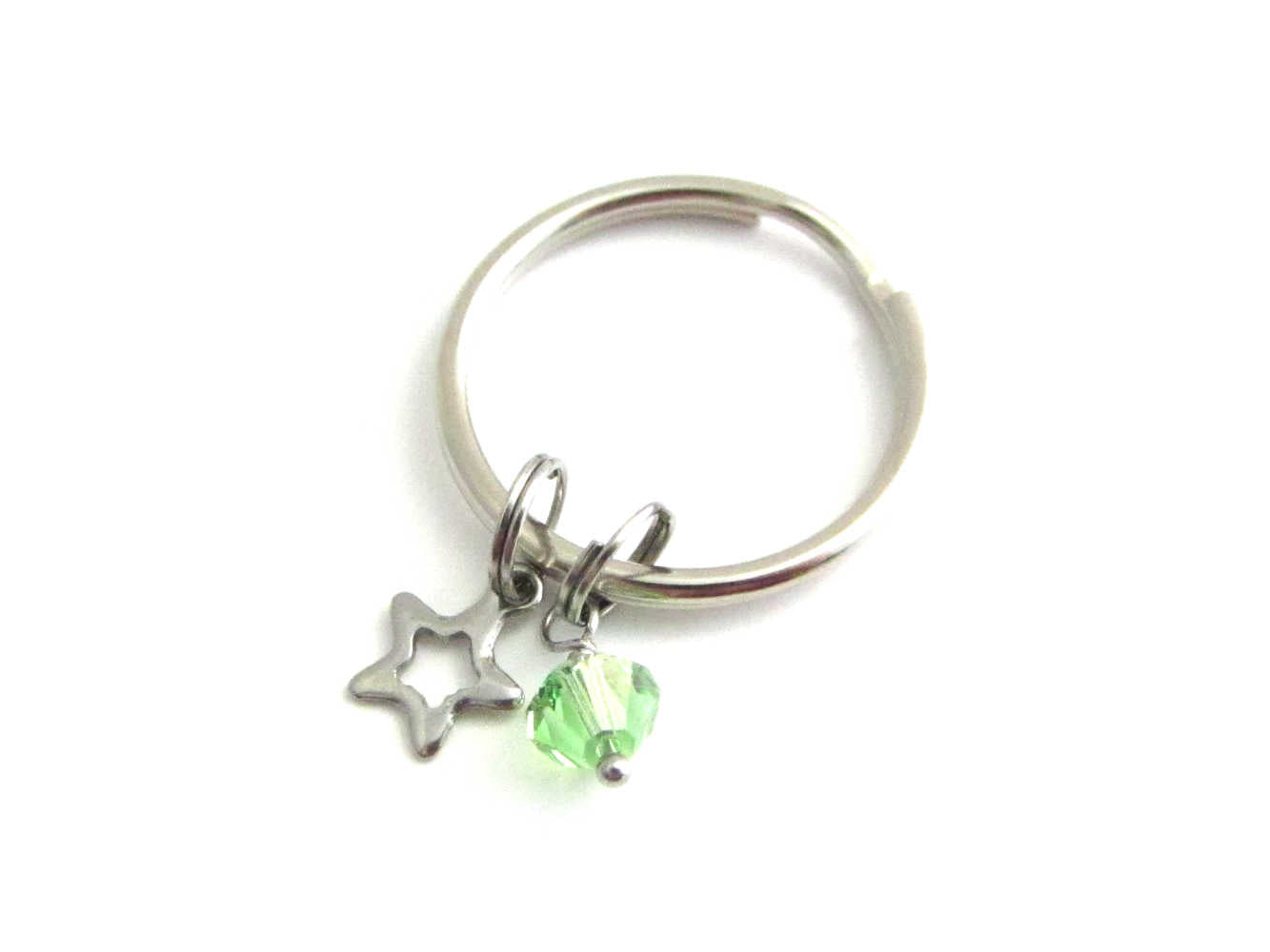stainless steel hollow star charm and a light green crystal charm on a keyring
