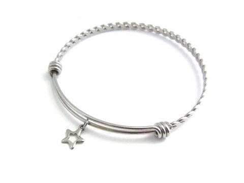 stainless steel hollow star charm on a bangle with braided twist pattern