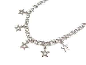 five small hollow star charms on a handmade chainmaille stainless steel chain necklace