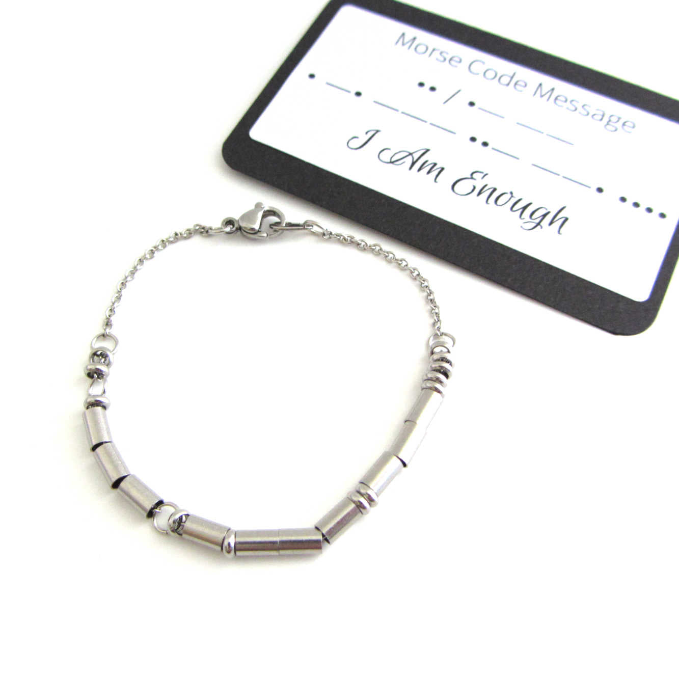 'I am enough' bracelet written in morse code stainless steel beads on a stainless steel chain with 'I Am Enough' morse code message card