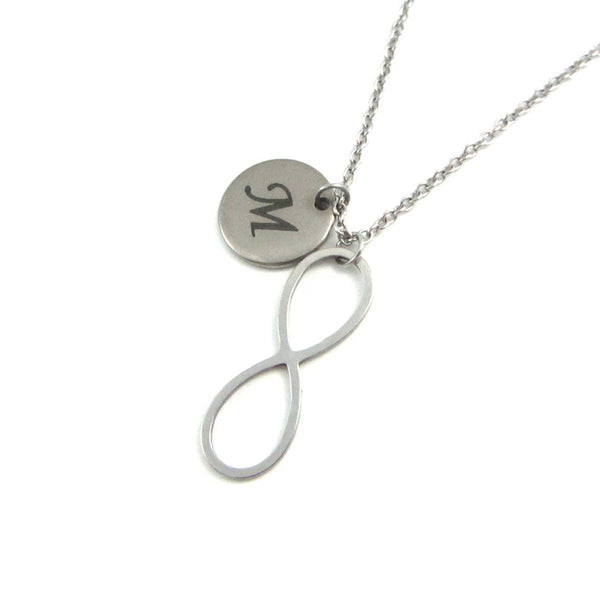 laser engraved capital initial letter disc charm and infinity charm on a stainless steel chain
