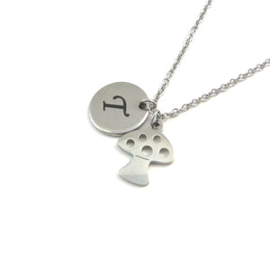 laser engraved capital initial letter disc charm and mushroom toadstool charm on a stainless steel chain