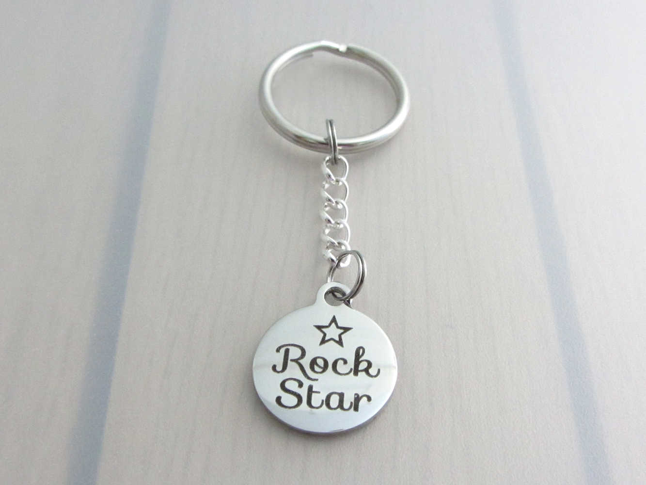 stainless steel laser engraved "rock star" with star charm on a chain keyring