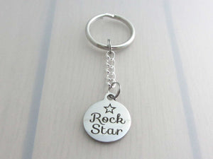 stainless steel laser engraved "rock star" with star charm on a chain keyring