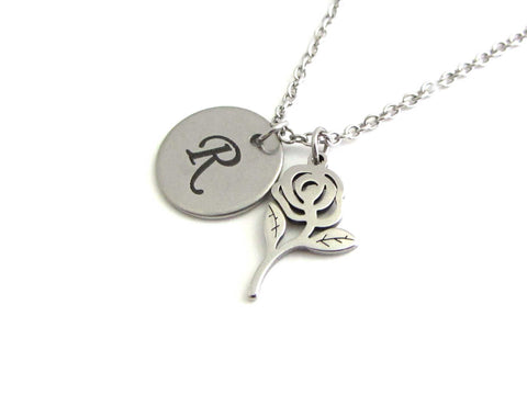 laser engraved capital initial letter disc charm and a rose flower charm on a stainless steel chain