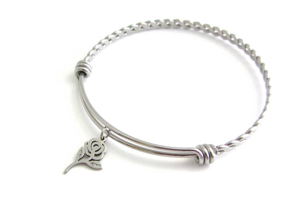 rose flower charm on a bangle with braided twist pattern