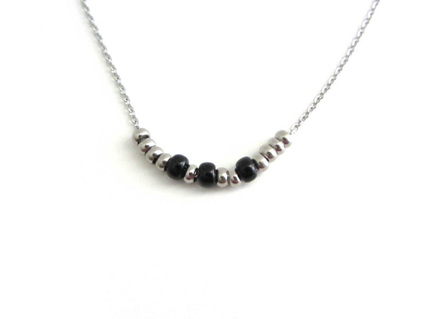 'sarah' name necklace written in morse code stainless steel and black glass seed beads on a stainless steel chain
