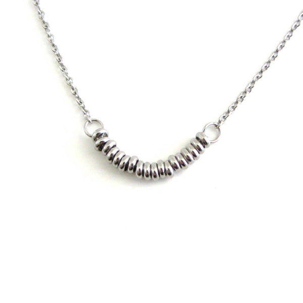 18 stainless steel beads one for each year necklace on a stainless steel chain