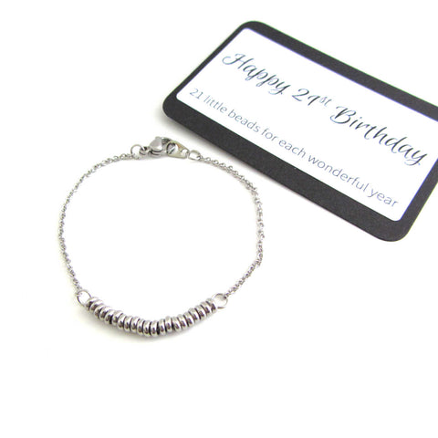 21 stainless steel bead one for each year bracelet on a stainless steel chain with happy 21st birthday message card