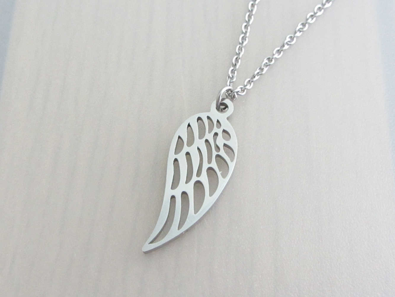 Stainless steel shop angel wing pendant