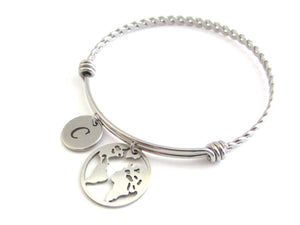 stainless steel laser engraved capital initial letter disc charm and world globe earth map charm on a bangle with braided twist pattern