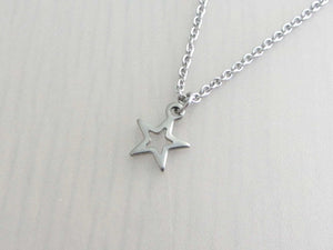small hollow star charm on a stainless steel chain