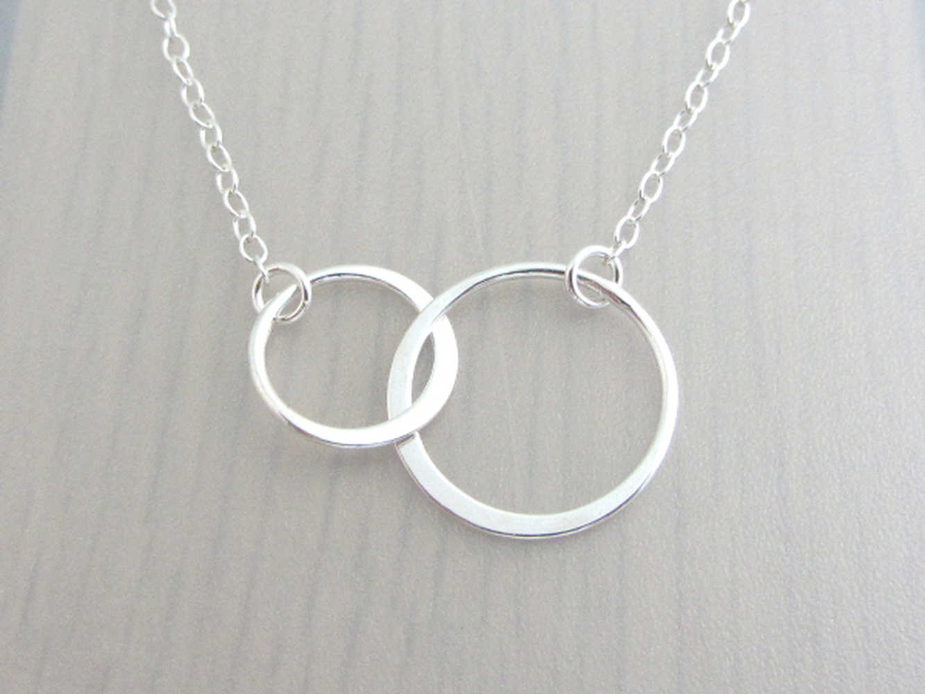 0.10 CT. T.W. Diamond Interlocking Circles Necklace in Sterling Silver |  Peoples Jewellers