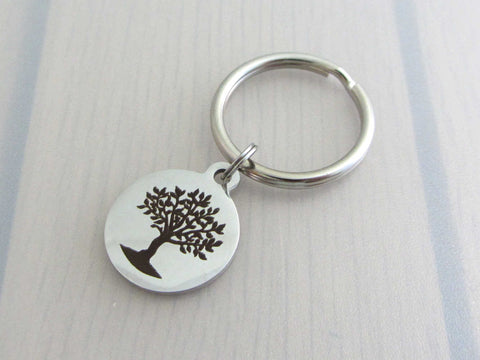 laser engraved tree charm on a keyring