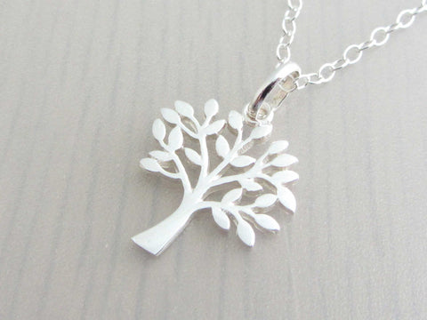 silver tree charm on a silver chain