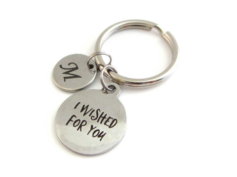 laser engraved capital initial letter disc charm and a laser engraved "I wished for you" charm on a keyring